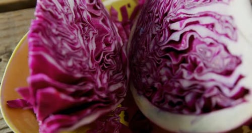 Red Cabbage Cut in Half on Plate