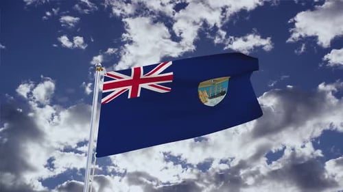 Flag of Saint Helena Waving Against Blue Sky