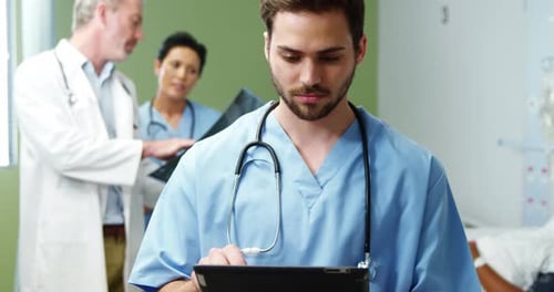 Doctor using a digital tablet in hospital