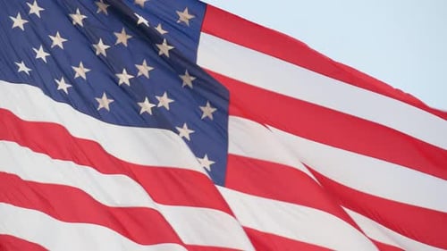 American Flag Waving Proudly in the Wind