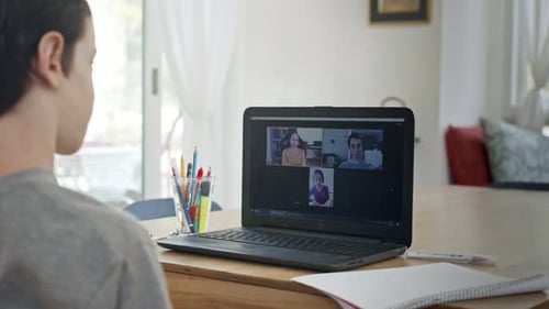 Teen Boy on Laptop Video Conference at Home