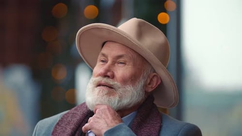 Senior Man in Hat Looking Upward