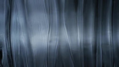 Abstract Textured Background with Ripples in Gray and Blue