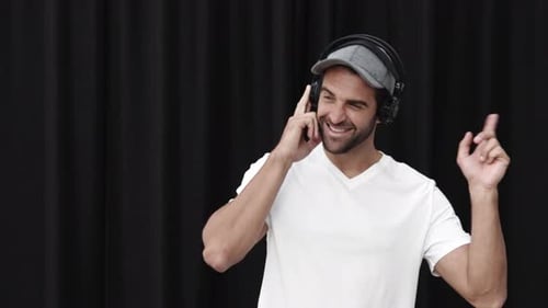 Man with Headphones Dancing to Music