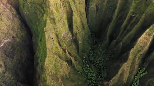Rocky Ridges and Deep Gorges of Peculiar Hawaiian Terrain. Aerial Topdown Footage
