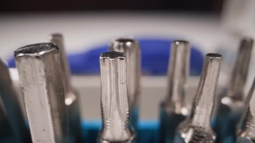 Collection of Shaped Metal Bits for Screwdriver in Toolbox