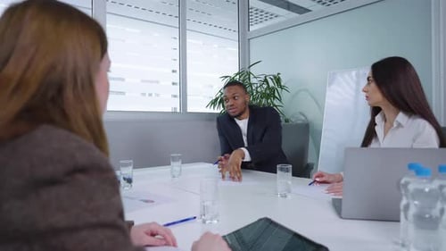 Business Professionals Meeting in Modern Office