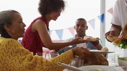 Family Sharing a Meal Together Indoors