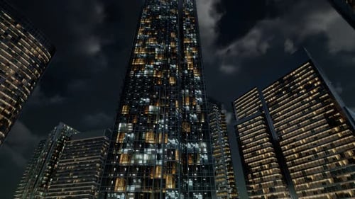 Edificios de oficinas de rascacielos de vidrio con cielo oscuro