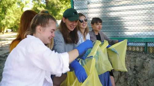 Volunteers Cleaning Up Trash on the Beach