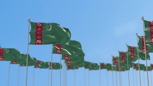 Waving Turkmenistan Flags in 3D Against Blue Sky