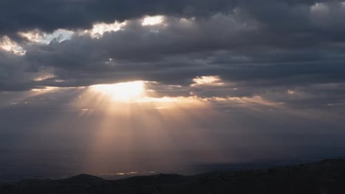 Heavenly Sun Rays Shining Through Clouds Time Lapse