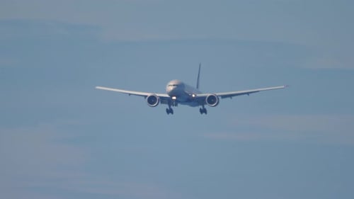 Commercial Airplane Preparing to Land in the Daytime