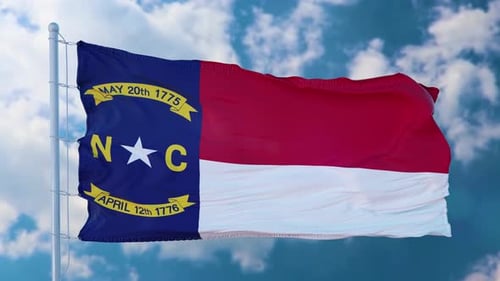 North Carolina Flag Waving Loop in Blue Sky