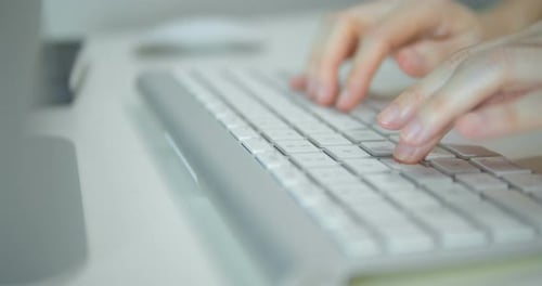 Close Up Typing On Computer