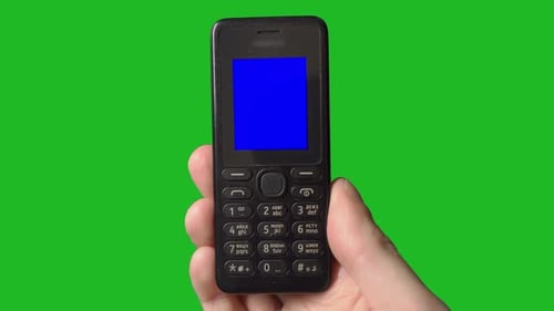 Person Using Old Vintage Mobile Phone