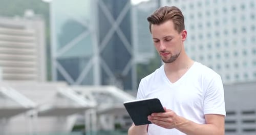 Caucasian Young Man Use of Tablet Computer