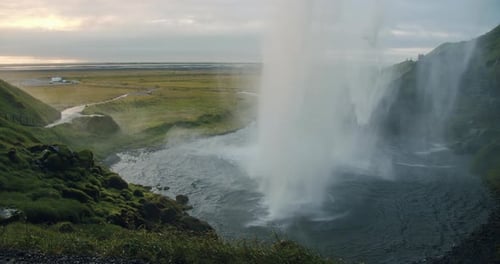 Seljalandfoss Waterfall in Summer Sunset Iceland