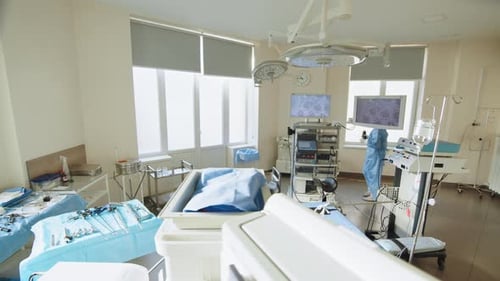 The Surgeon Prepares the Operation for Laparoscopic Surgery
