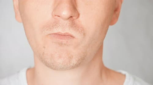 Close Up Face Guy Eating Doughnut