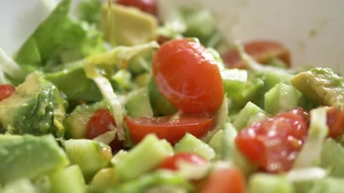 Close Up of Fresh Salad with Olive Oil