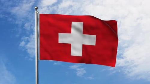 Waving Switzerland Flag on Pole Against Blue Sky
