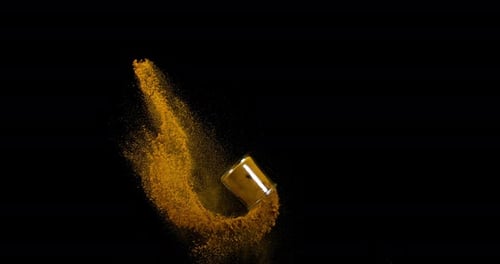 Curry Powder falling against Black Background, Slow motion 4K
