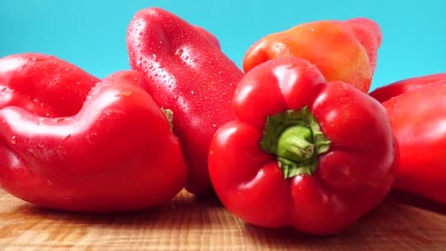 Fresh Red Bell Peppers with Water Droplets