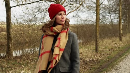 Woman Walking in Nature on a Dirt Path