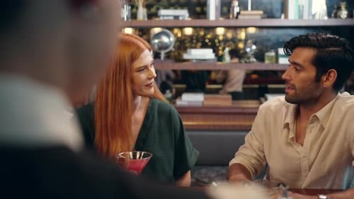 4K Group of People enjoy hangout nightlife at luxury bar.