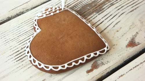 Decorating Gingerbread Heart Cookie with Frosting