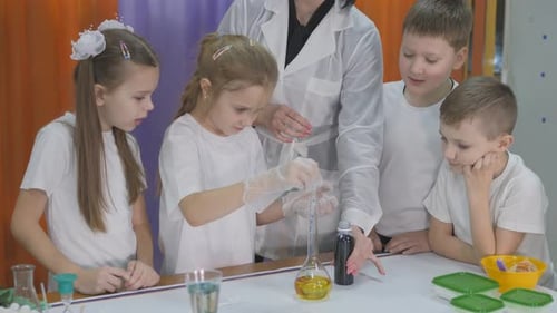Children Doing Science Experiment in Class