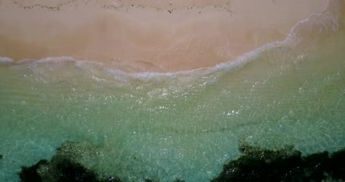 Wide angle above abstract view of a summer white paradise sand beach and blue ocean background in co