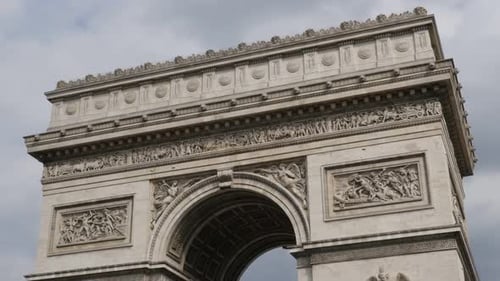 Symbol of France and Paris Arc de Triomphe by the day 4K 2160p 30fps UltraHD tilt footage - French