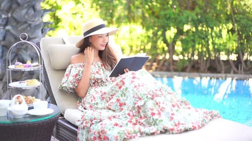 Young asian woman read book