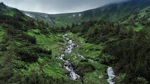 Aerial View Of A Plateau Waterfall High Mountain Range Surrounding