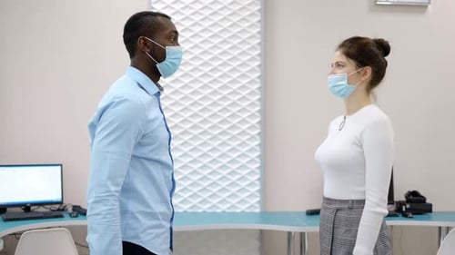 Two Businessmen in Medical Mask Meet Each Other and Go To Work Together in Modern Office Building