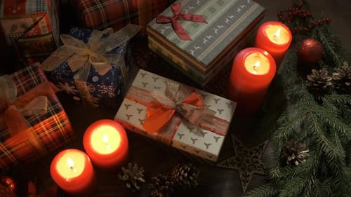 Lights Out Candles on a Table Decorated with Christmas Decorations