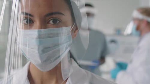 Medical Worker in Face Shield and Mask