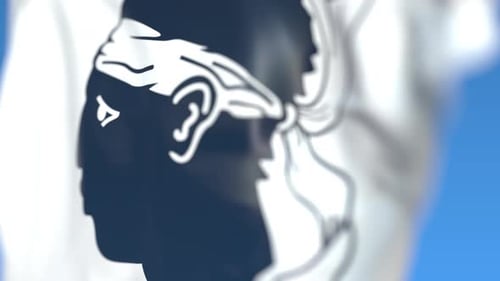 Waving Corsican Flag with Iconic Moor's Head Emblem