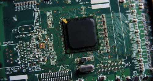 Rotates Electronic Circuit Board with Processor Computer Chips and Capacitors