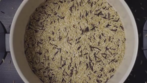 Wild and Brown Rice in a White Pot