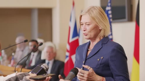 Woman Giving Speech at Press Conference