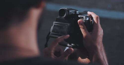 Man Using Camera with Screen, Close Up