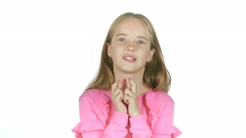 Child with Fingers Crossed Hoping