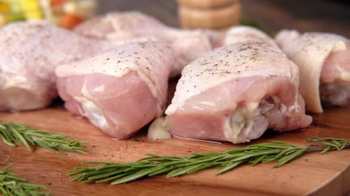 Fresh Chicken Drumsticks with Rosemary Close Up