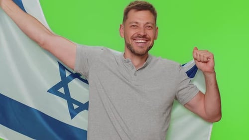 Smiling Man Waving Flag on Green Screen