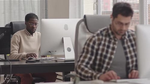 Programmers Team Working in Office
