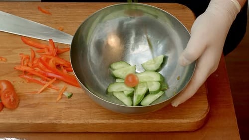Chef in Restaurant Put Vegetables To the Dish, Preparing Salad