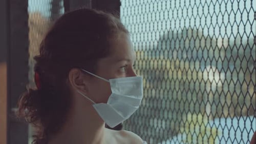 Young Woman Wearing Protective Medical Face Mask
